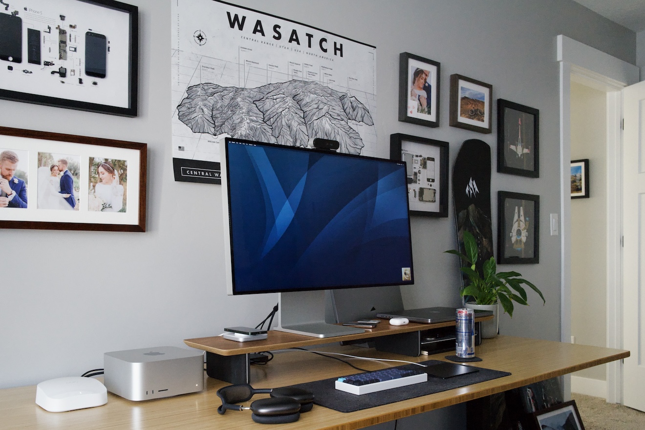 A photograph of the desk and surrounding art in my home office